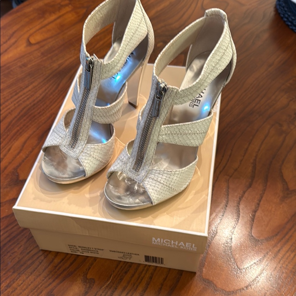 MICHAEL Michael Kors Cream Heels with High Stiletto and Intricate Cutout Design